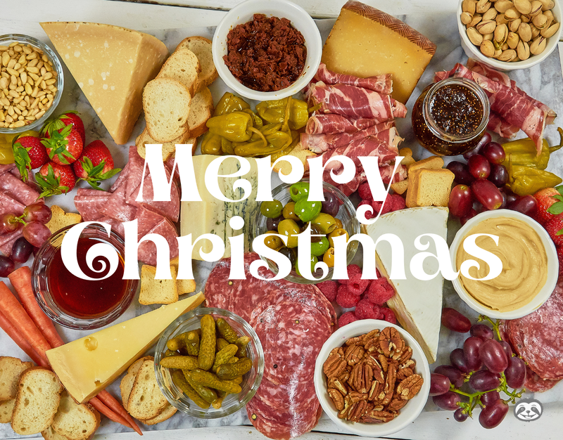 Greeting Card Cover of cured meats, cheeses, nuts, and pickles, and the words "Merry Christmas"