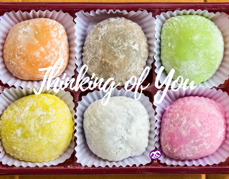 Greeting Card Cover of colorful mochi bites, and the words Thinking of You"