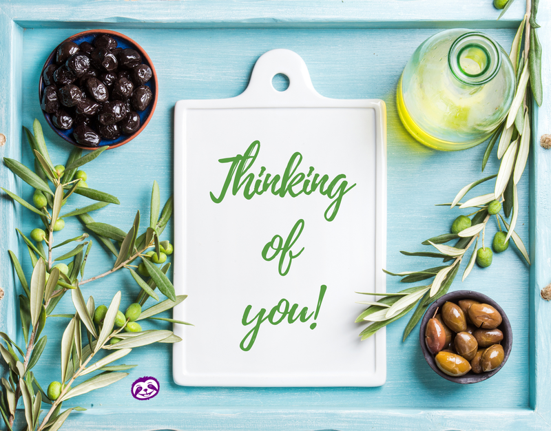 Greeting Card Cover of delicious olives and olive oil, and the words “Thinking of You"