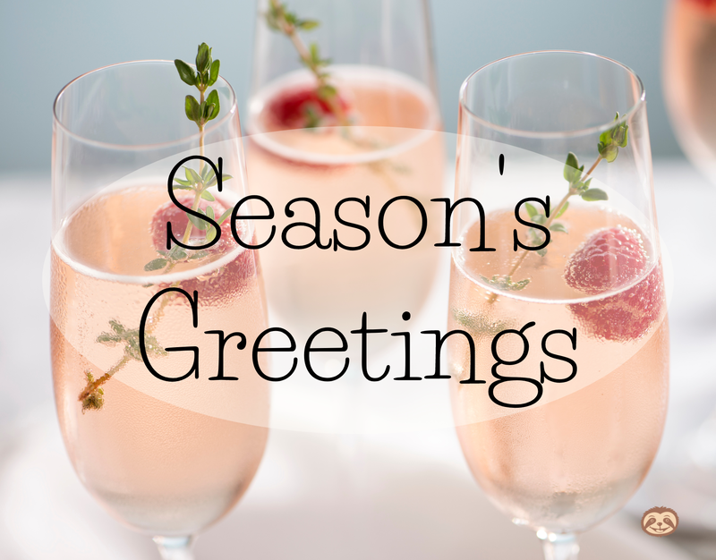 Greeting Card Cover of three glasses of pink champagne, raspberries, and thyme, and the words "Season's Greetings"